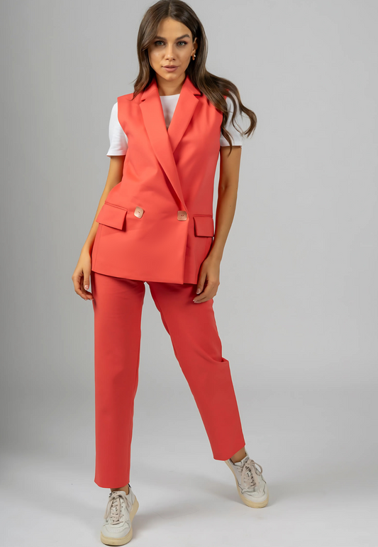 
Italian blazer suit, Coral blazer outfit, Organic cotton suit, Sustainable fashion, Double-breasted blazer, Sleeveless blazer, High-quality trousers, Luxury women’s suit, Made in Italy fashion, Professional women's attire, Elegant evening wear, V neckline suit