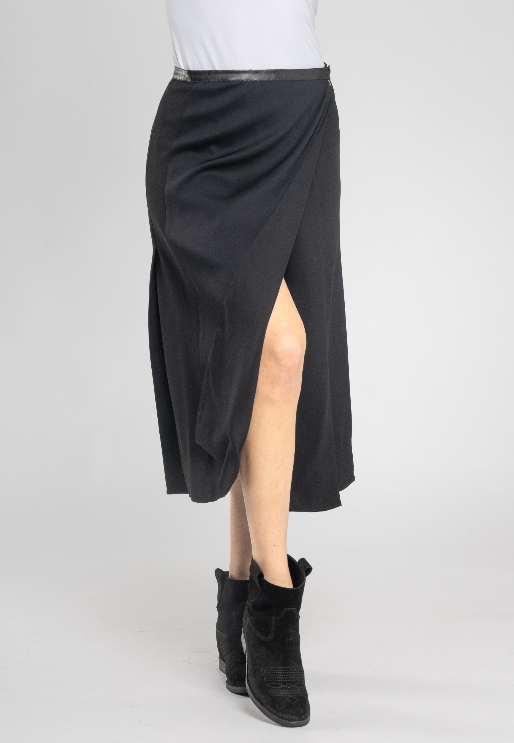 Italian made midi skirt, chic eco-friendly skirt, Italian viscose skirt, black A-line skirt, split midi skirt, stylish eco-leather waistband, luxury Italian fabric, sustainable fashion skirt