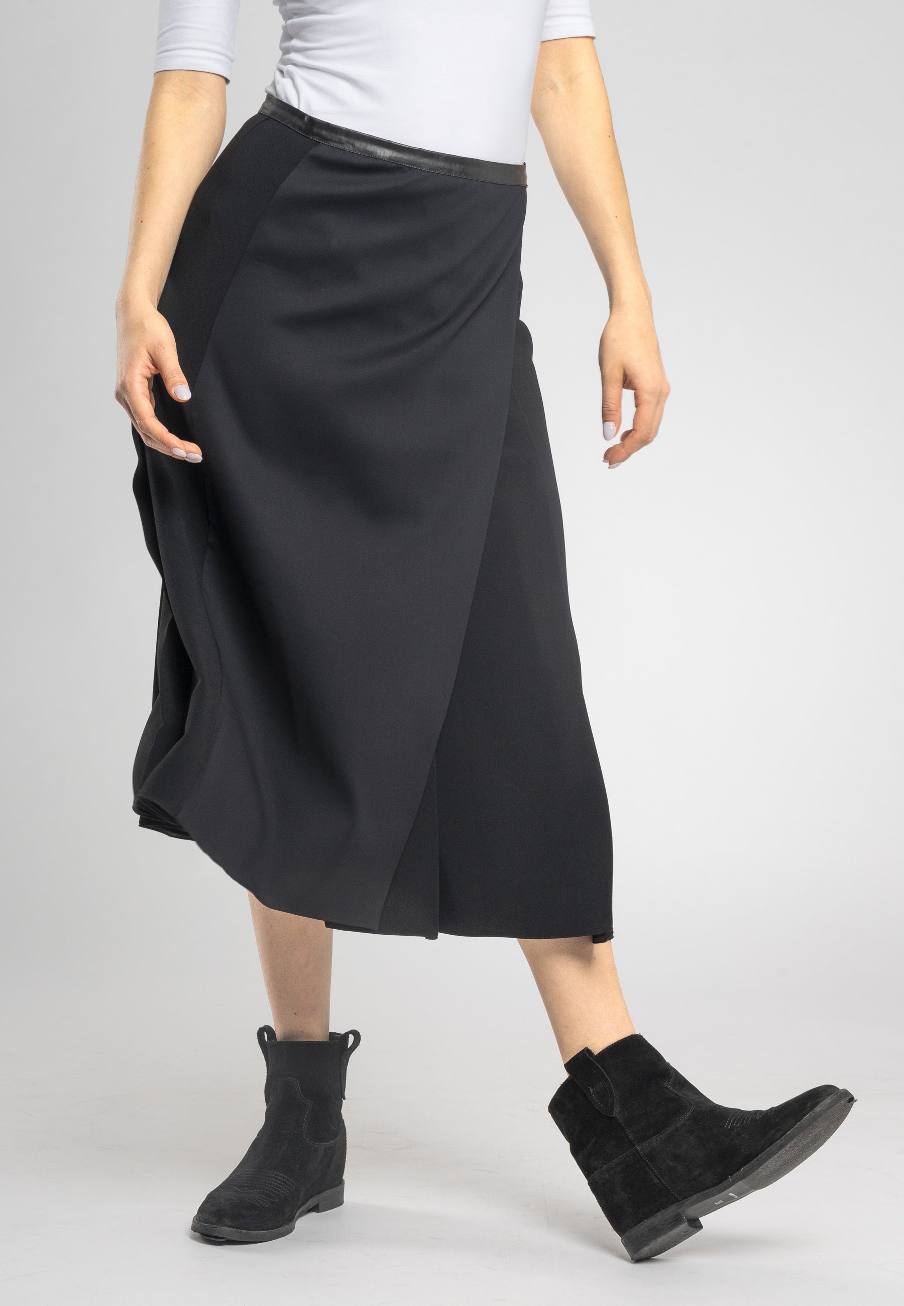 Italian made midi skirt, chic eco-friendly skirt, Italian viscose skirt, black A-line skirt, split midi skirt, stylish eco-leather waistband, luxury Italian fabric, sustainable fashion skirt